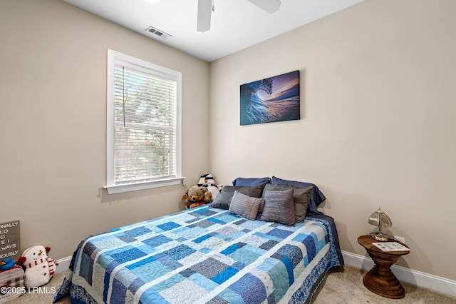 2654 Broad St, Beaufort, SC 29902 - carpeted bedroom featuring multiple windows, baseboards, and ceiling fan