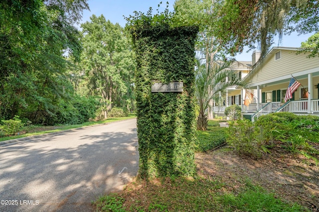2654 Broad St, Beaufort, SC 29902 - view of property exterior featuring covered porch and a chimney