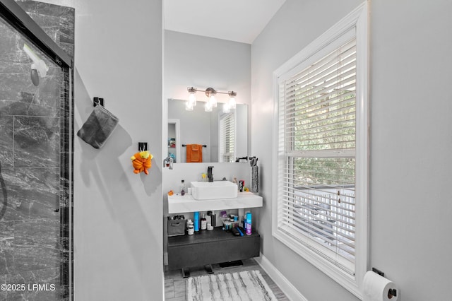 2654 Broad St, Beaufort, SC 29902 - full bathroom featuring tiled shower, a sink, and baseboards