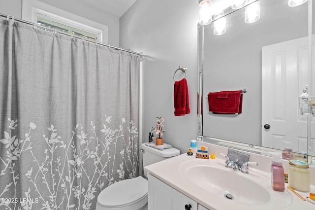 2654 Broad St, Beaufort, SC 29902 - full bath featuring vanity, toilet, and curtained shower