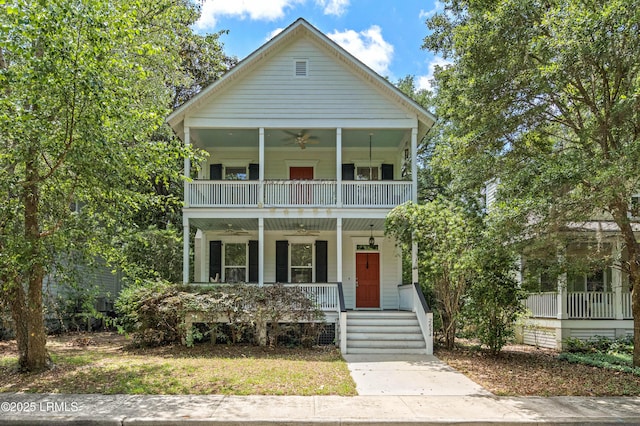 2654 Broad St, Beaufort, SC 29902 - view of front facade with ceiling fan, covered porch, and a balcony