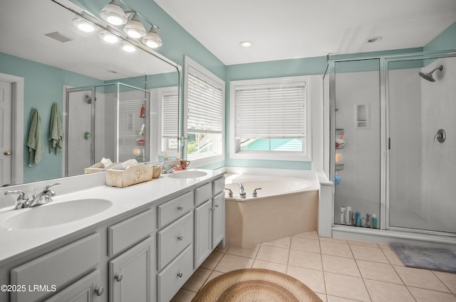 49 National Blvd, Beaufort, SC 29907 - bathroom with a stall shower, double vanity, a bath, and tile patterned floors