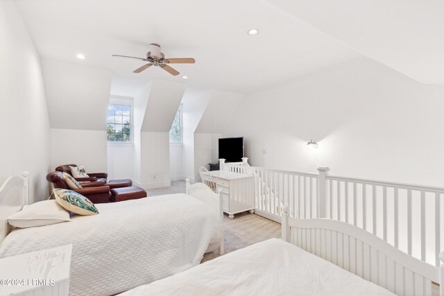 bedroom featuring vaulted ceiling and ceiling fan