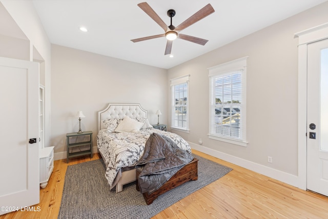 bedroom featuring ceiling fan and hardwood / wood-style floors