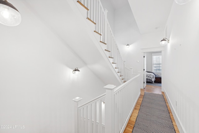 hallway with wood-type flooring