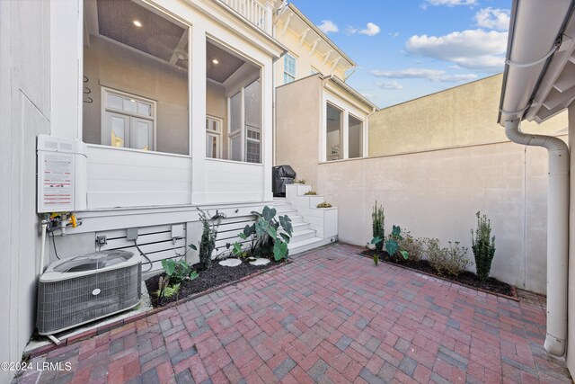 view of patio featuring cooling unit