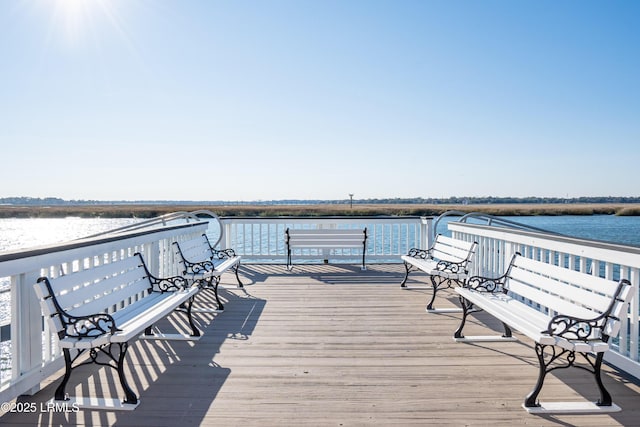 deck featuring a water view