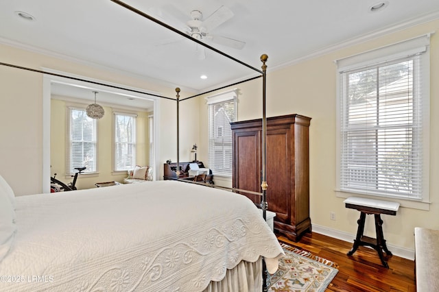 bedroom featuring ceiling fan, recessed lighting, baseboards, dark wood finished floors, and crown molding