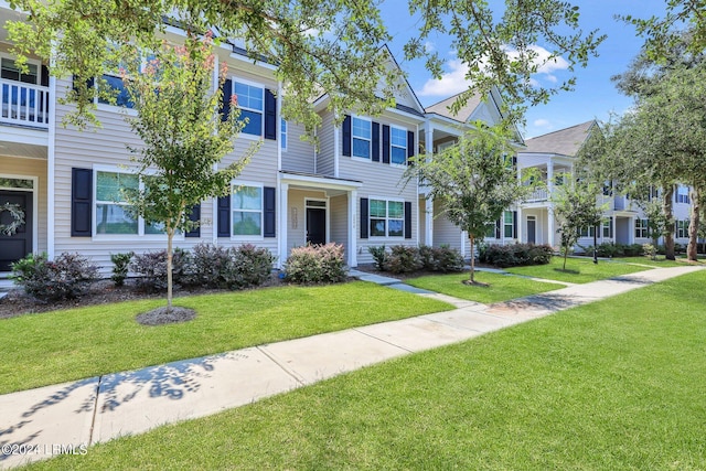 view of front of property with a front lawn