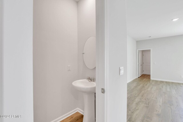 bathroom featuring hardwood / wood-style flooring