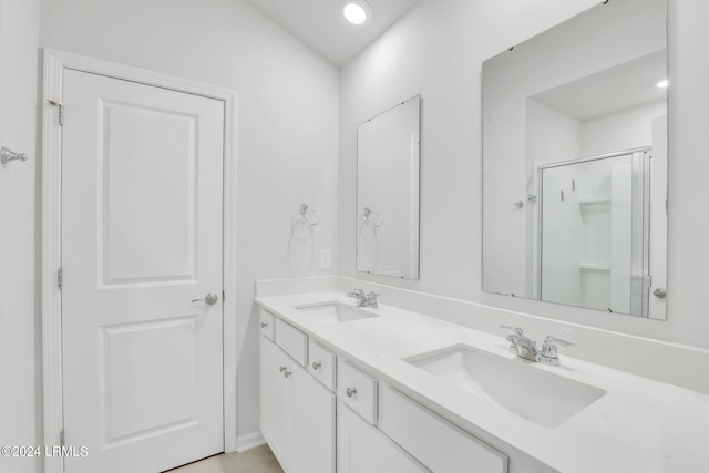 bathroom featuring vanity and walk in shower