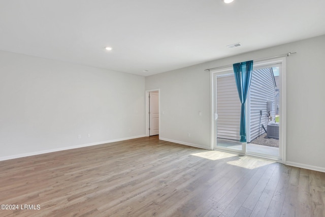 empty room with light wood-type flooring