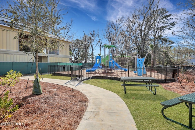 view of jungle gym featuring a lawn