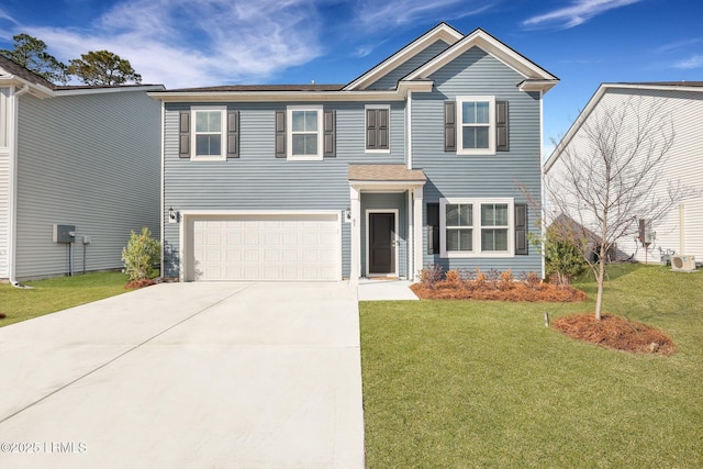 view of front of home with a garage and a front lawn