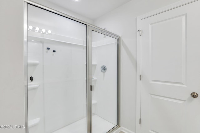 bathroom with an enclosed shower