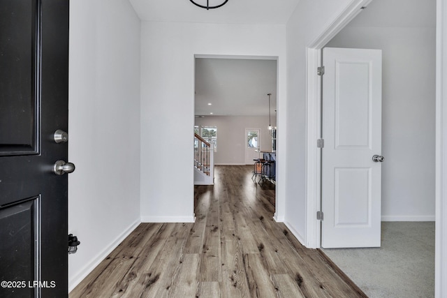 hallway featuring light hardwood / wood-style floors