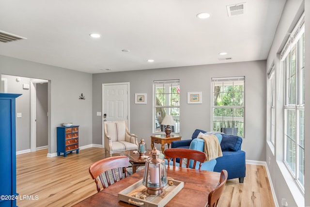 dining space with recessed lighting, baseboards, visible vents, and light wood-style floors
