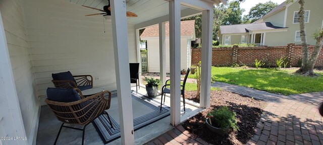 exterior space with ceiling fan