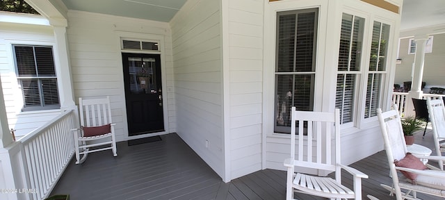 entrance to property with a porch