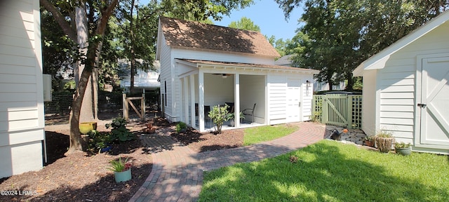 exterior space featuring a shed