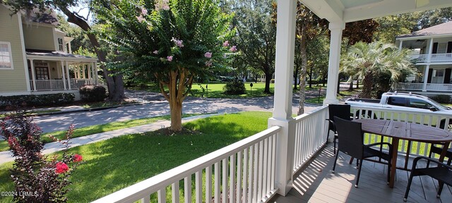 balcony featuring a porch