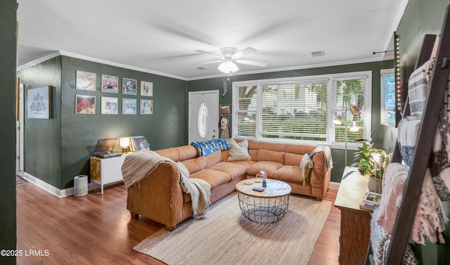 1508 London Ave, Port Royal, SC 29935 - living area featuring wood finished floors, ornamental molding, and ceiling fan