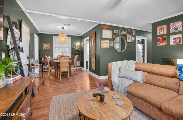1508 London Ave, Port Royal, SC 29935 - living area featuring ornamental molding and wood finished floors