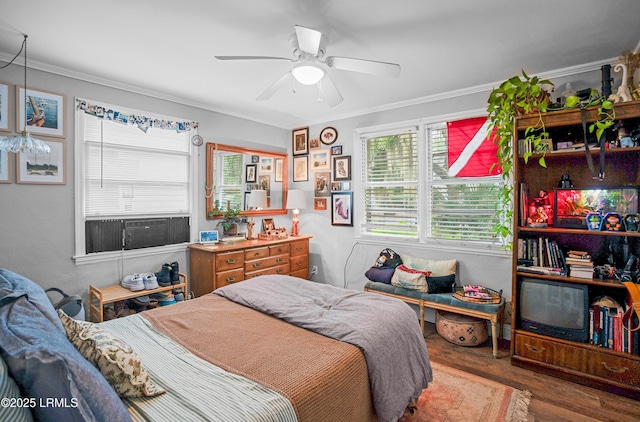 1508 London Ave, Port Royal, SC 29935 - bedroom featuring crown molding, wood finished floors, and ceiling fan