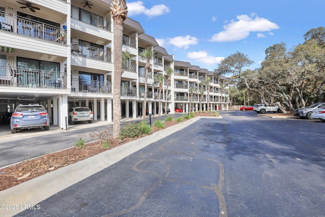 view of property with uncovered parking