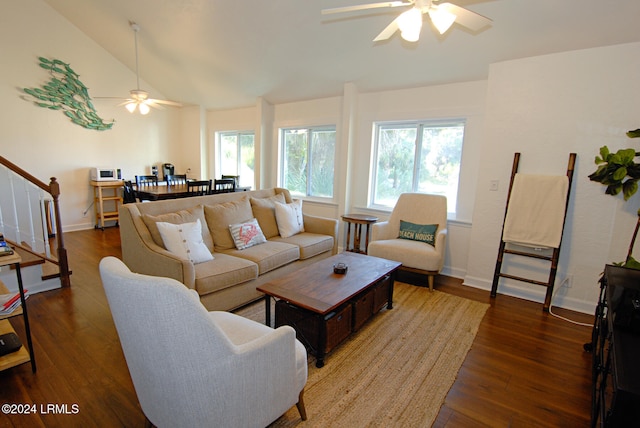 living area with ceiling fan, stairs, wood finished floors, and lofted ceiling