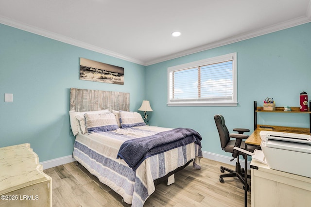 bedroom featuring crown molding and light wood-type flooring