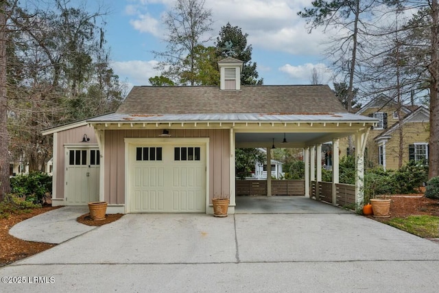 garage featuring driveway