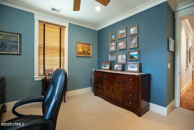 office featuring carpet, baseboards, and crown molding