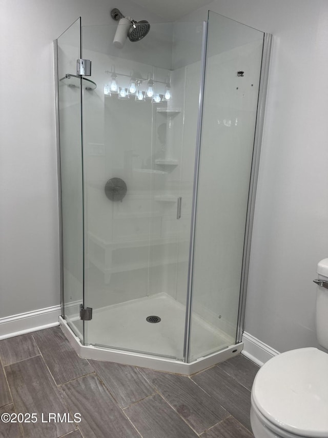 14007 Kader St, Beaufort, SC 29906 - bathroom with a stall shower and wood finish floors
