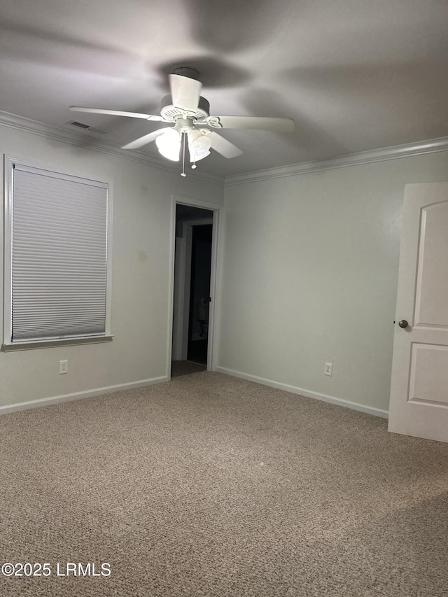 14007 Kader St, Beaufort, SC 29906 - spare room featuring ornamental molding, carpet flooring, and a ceiling fan