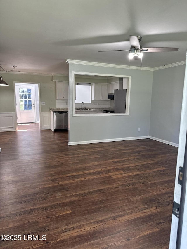 14007 Kader St, Beaufort, SC 29906 - unfurnished living room with crown molding, ceiling fan, and dark wood finished floors