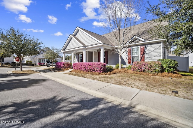 view of front of property featuring covered porch