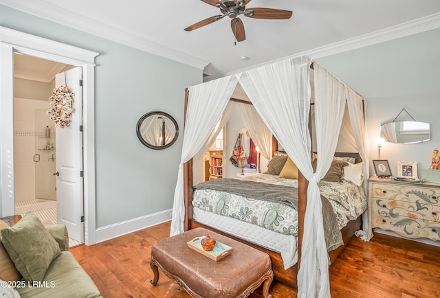 bedroom featuring ceiling fan, baseboards, wood finished floors, and crown molding