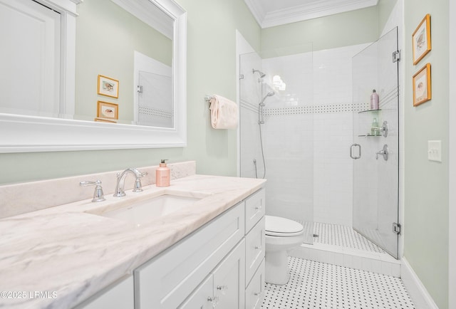 full bathroom featuring vanity, a stall shower, ornamental molding, tile patterned floors, and toilet