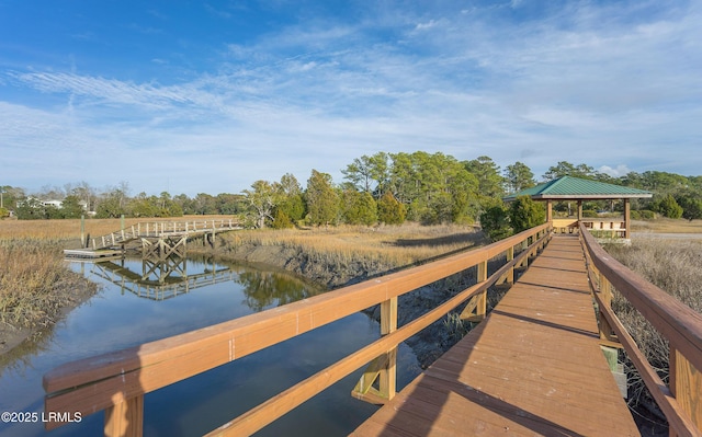 dock area featuring a gazebo and a water view