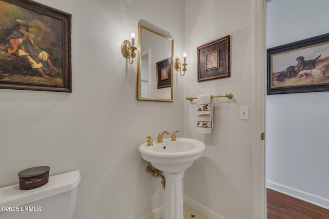 bathroom featuring toilet