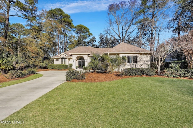 view of front of property with a front lawn