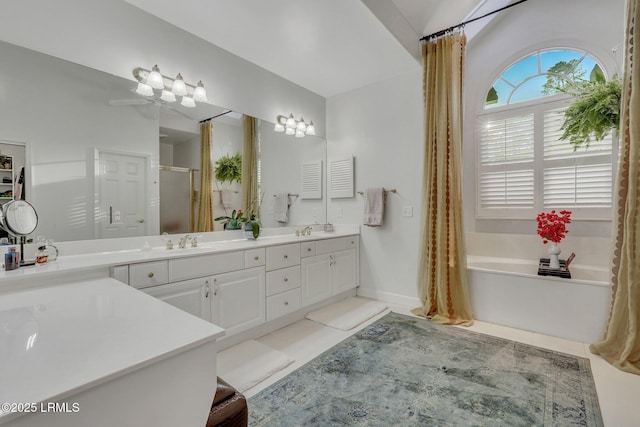 bathroom with vanity, separate shower and tub, and tile patterned floors