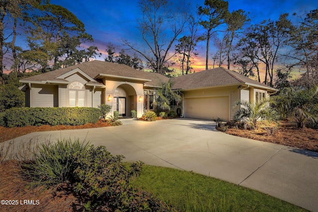 view of front of home featuring a garage