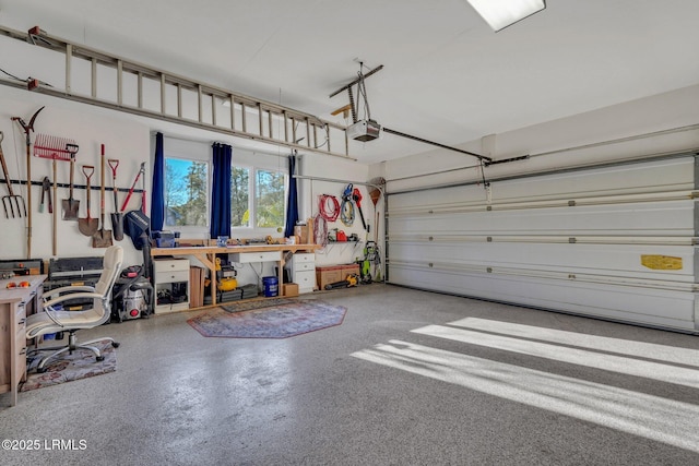 garage featuring a garage door opener