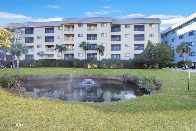 view of building exterior featuring a water view