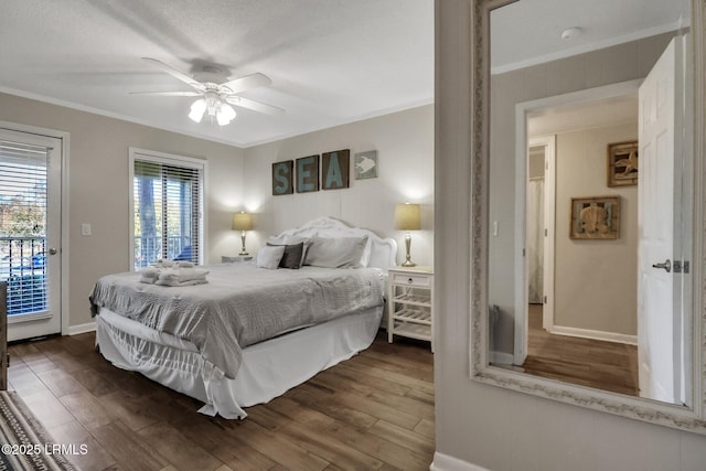 bedroom featuring crown molding, dark hardwood / wood-style flooring, access to outside, and ceiling fan