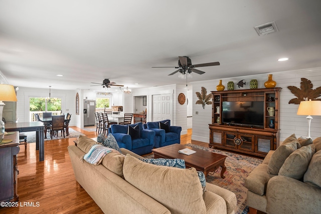 738 Marlin Dr, Fripp Island, SC 29920 - living room featuring ceiling fan, light wood-style flooring, recessed lighting, and wooden walls