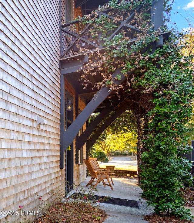 property entrance featuring a patio area