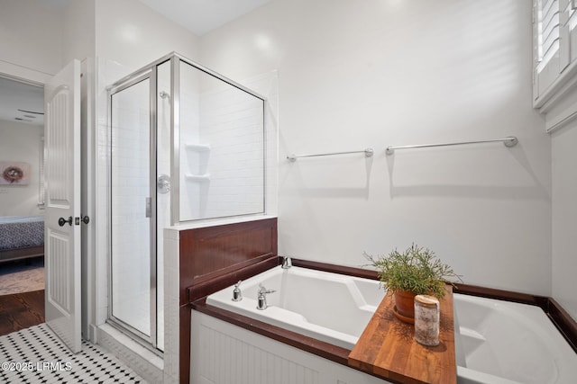 bathroom featuring plus walk in shower